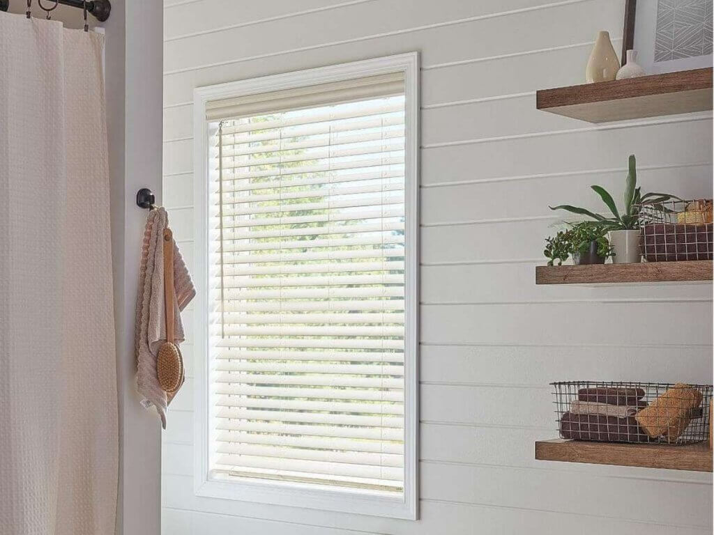 For homeowners who love the appearance of wood, faux wood blinds are a perfect alternative that resists moisture and warping.